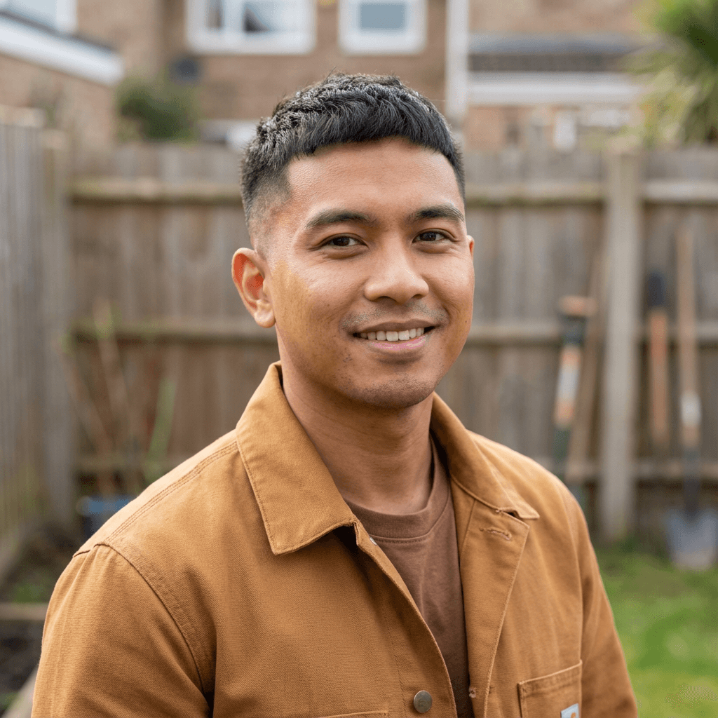 Marcus Chen standing in a newly renovated bathroom